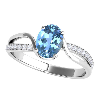 Maulijewels 1.40 Carat Oval Shape Blue-Topaz & Round White Diamond Gemstone Ring with an Enchanting Split Shank Design in Prong-Setting 14K White, Yellow, and Rose Gold